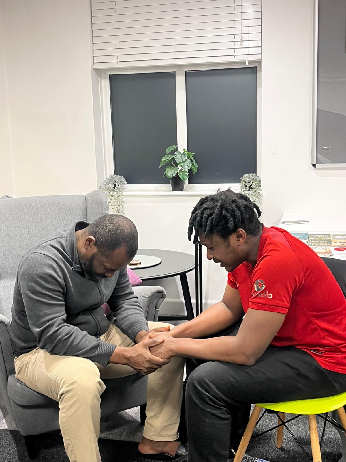 Men in worship at an event